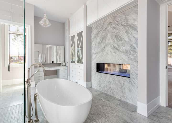 Different styles of bathroom tile add a modern and polished look to this La Crascent, CA home,