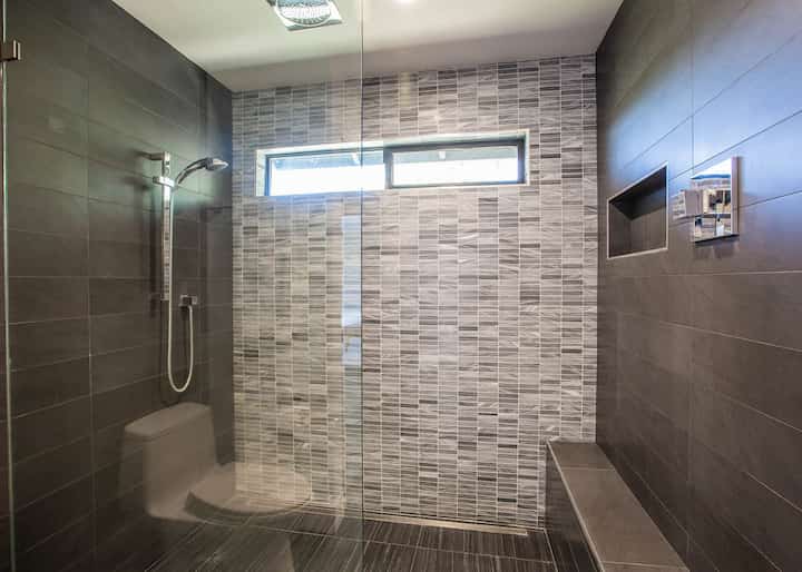 A new shower installation adds a modern look to this La Crescenta, CA bathroom.